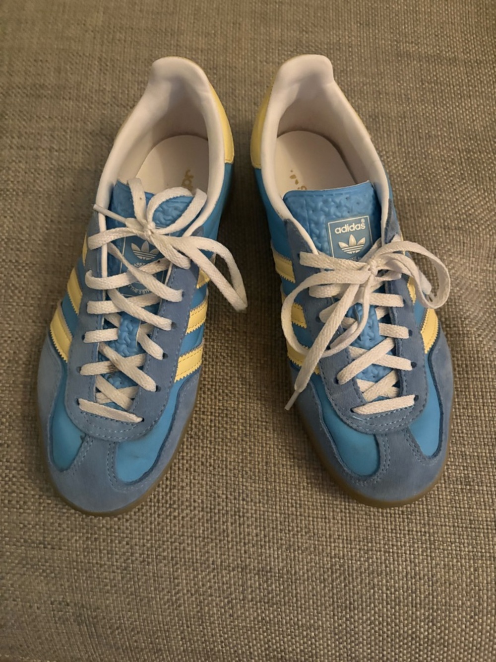 Adidas Gazelle Light Blue and Yellow sneakers.